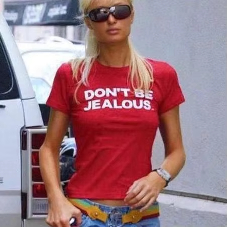 Street Fashion In Paris - Paris Hilton 'Don't Be Jealous' bedrucktes